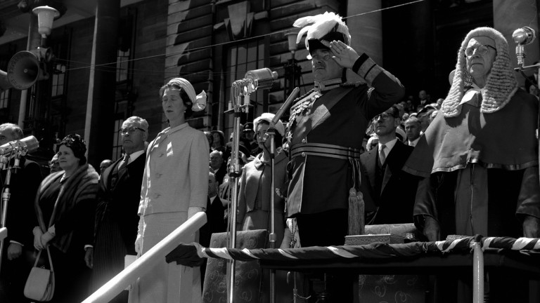 Looking up at the dais during Sir Guy Powles's swearing-in ceremony at Parliament 1962